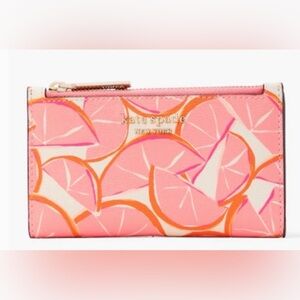 KATE SPADE SPENCER GRAPEFRUIT SMALL SLIM BIFOLD WALLET